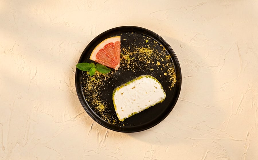 Arabic ice cream at Derian, Yerevan — Milk thickened with sahlab and scented with mastic — the stretchy, faintly floral ice cream of the Levant, cut thick.