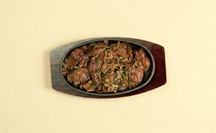 Chicken liver at Derian, Yerevan — Chicken liver seared with spices — soft, mineral and quick to arrive, a small plate that punches well above its size.