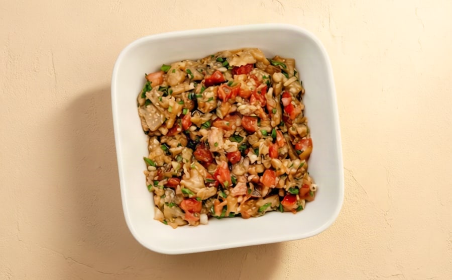 Eggplant salad at Derian, Yerevan — Eggplant with tomato and herbs, served cool — soft where the others are crisp, and a good foil to anything grilled.