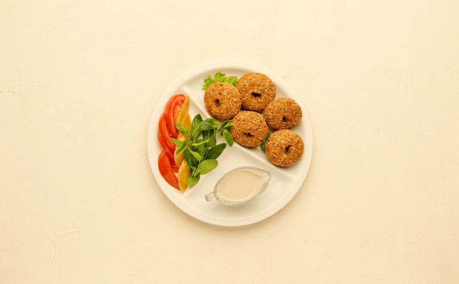 Falafel at Derian, Yerevan — Chickpeas ground with herbs and spices, fried until the crust turns dark and craggy while the middle stays soft.