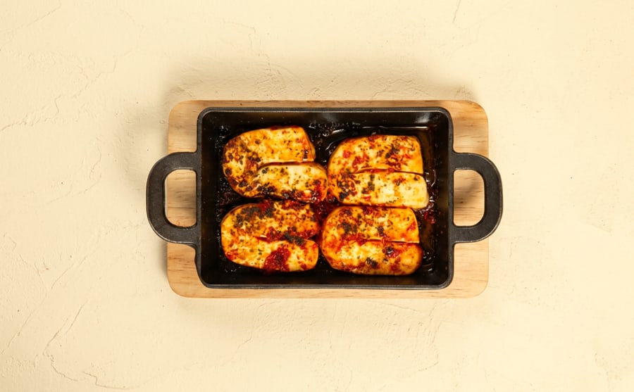 Fried halloumi at Derian, Yerevan — Halloumi fried until the surface turns gold and squeaks — salty, hot, and improved by nothing more than lemon.