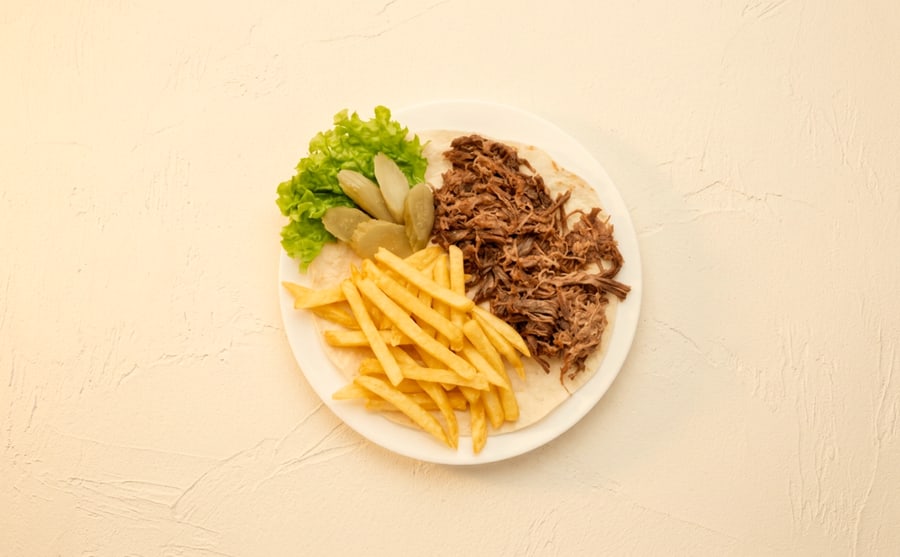 Ghawarma at Derian, Yerevan — Preserved ghawarma meat with spices — intensely savoury and rich, best spooned over rice or folded into warm lavash.