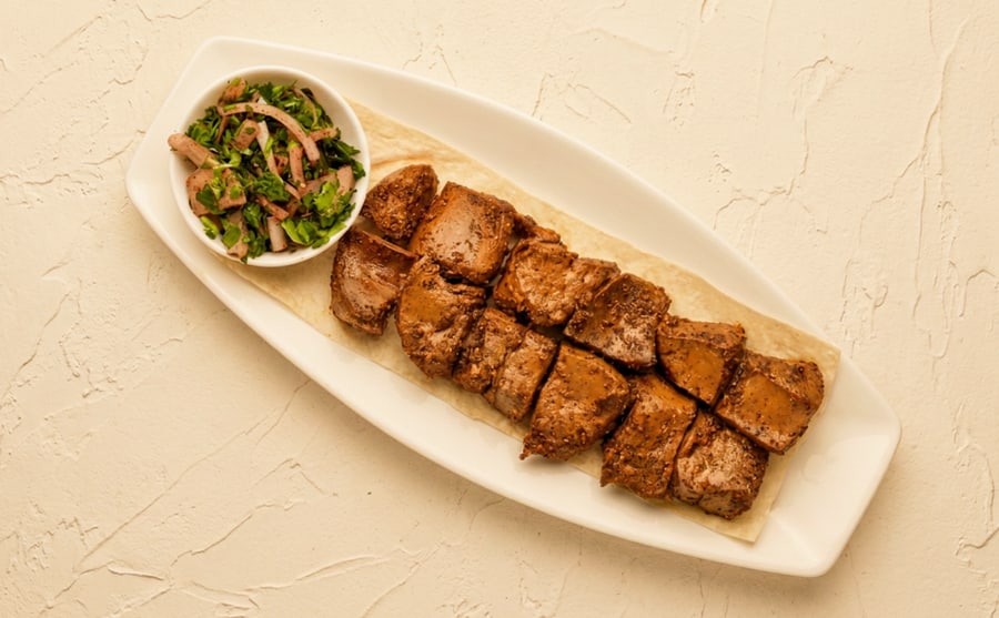 Liver BBQ at Derian, Yerevan — Liver grilled fast over coals with spices — smoky, mineral and direct, and it wants raw onion and warm lavash beside it.