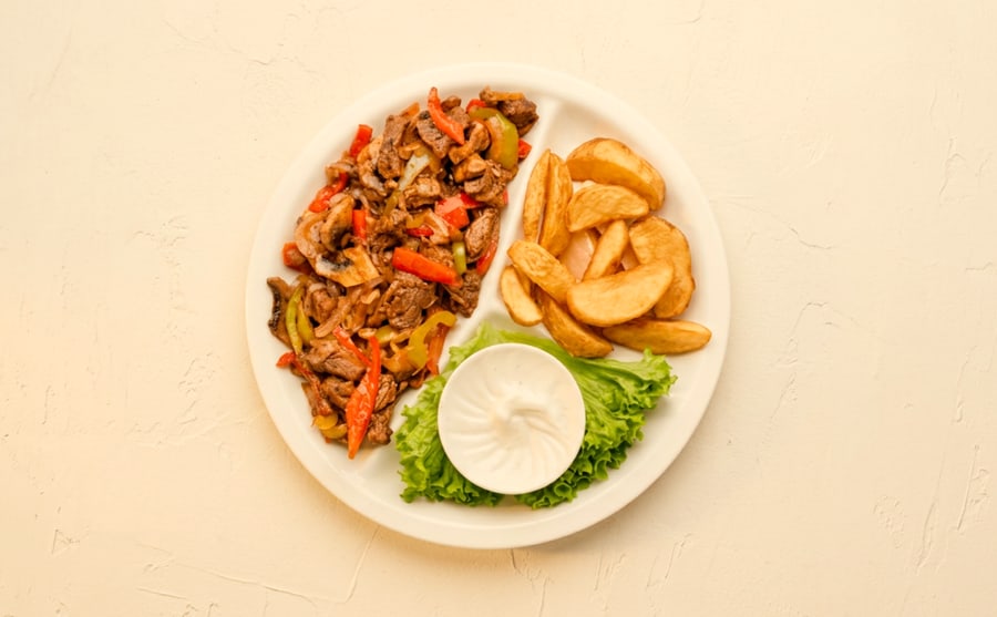 Mexicano plate at Derian, Yerevan — The same house sauce and spiced meat, served as a full plate — a main course rather than something to pass around.