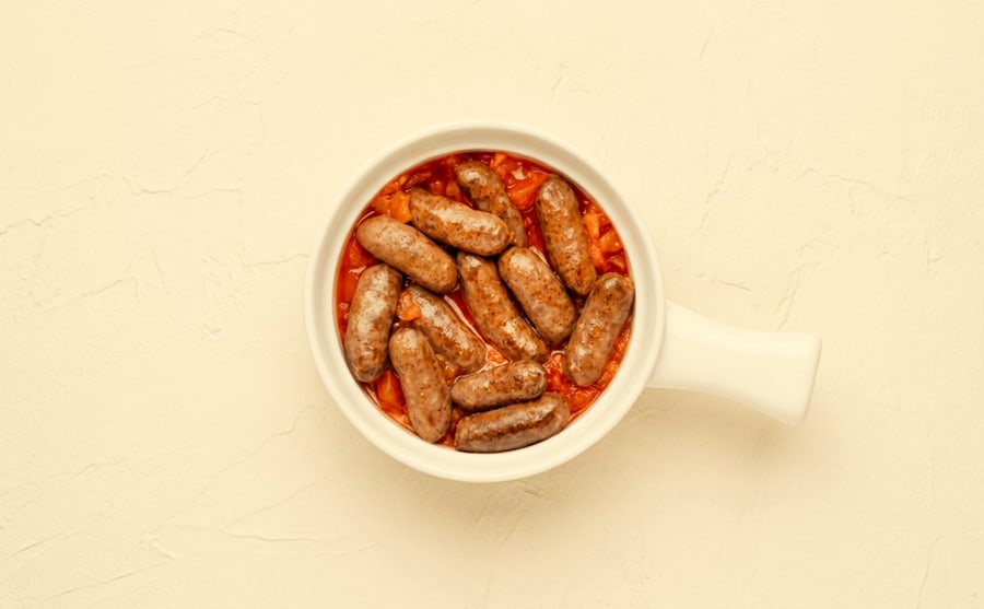 Sasijo at Derian, Yerevan — Small sausages simmered in tomato sauce — punchy, soft and unfussy, the plate people mop up with the last lavash.