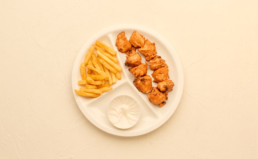 Shish tawook at Derian, Yerevan — Chicken marinated in spices and grilled on the skewer — soft, lightly spiced, and best pulled into lavash with garlic cream.