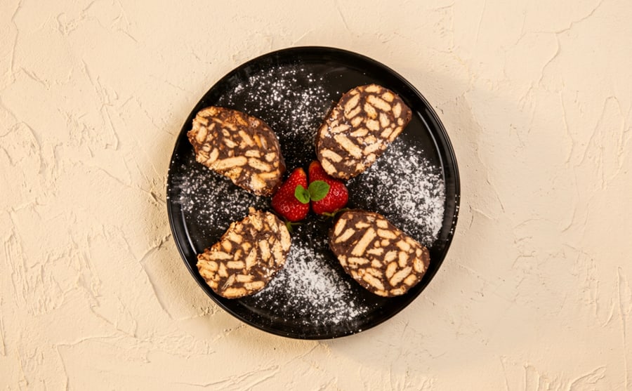 Sukseh at Derian, Yerevan — Flour, sesame and sugar baked into small dry sweets — mild, nutty, and the sort of thing you keep taking one more of.
